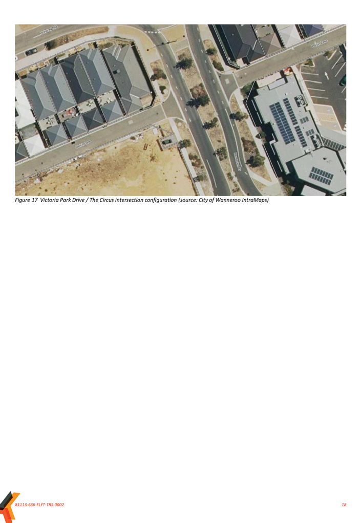 A aerial view of a road and buildings

Description automatically generated