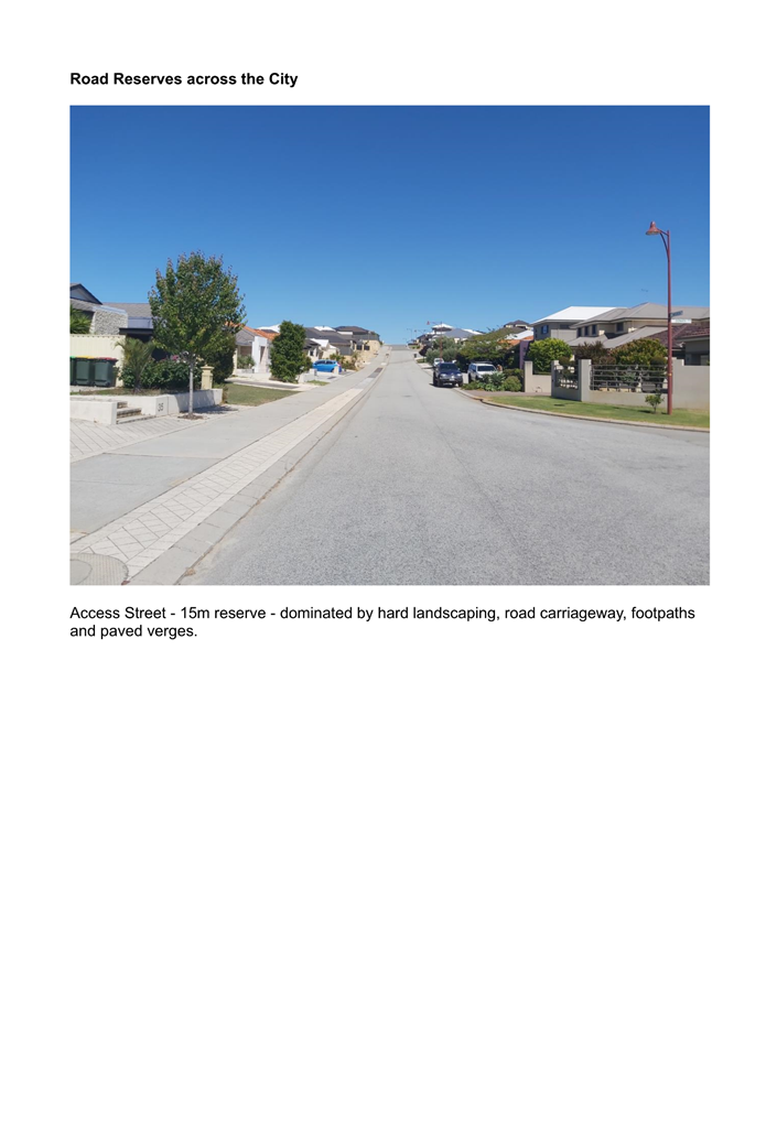 A road with houses and trees

Description automatically generated
