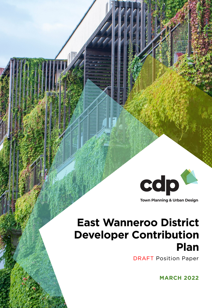 A cover of a building with plants growing on it

Description automatically generated