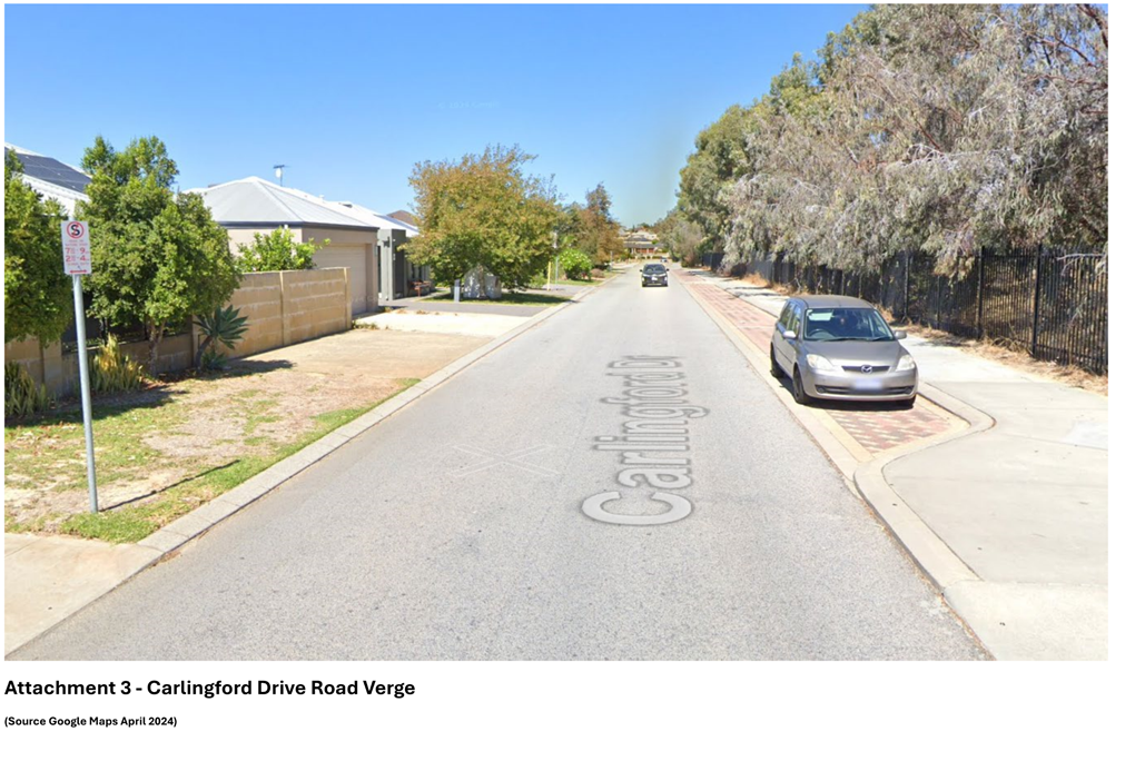 A street with cars parked on it

Description automatically generated