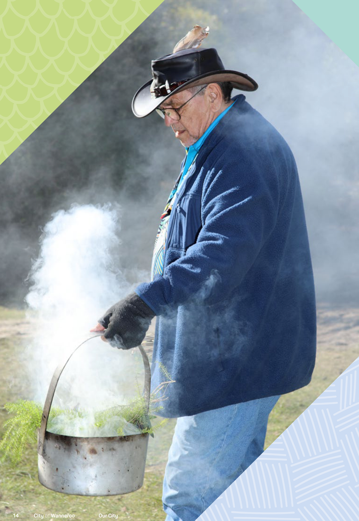 A person holding a bucket of smoke

Description automatically generated