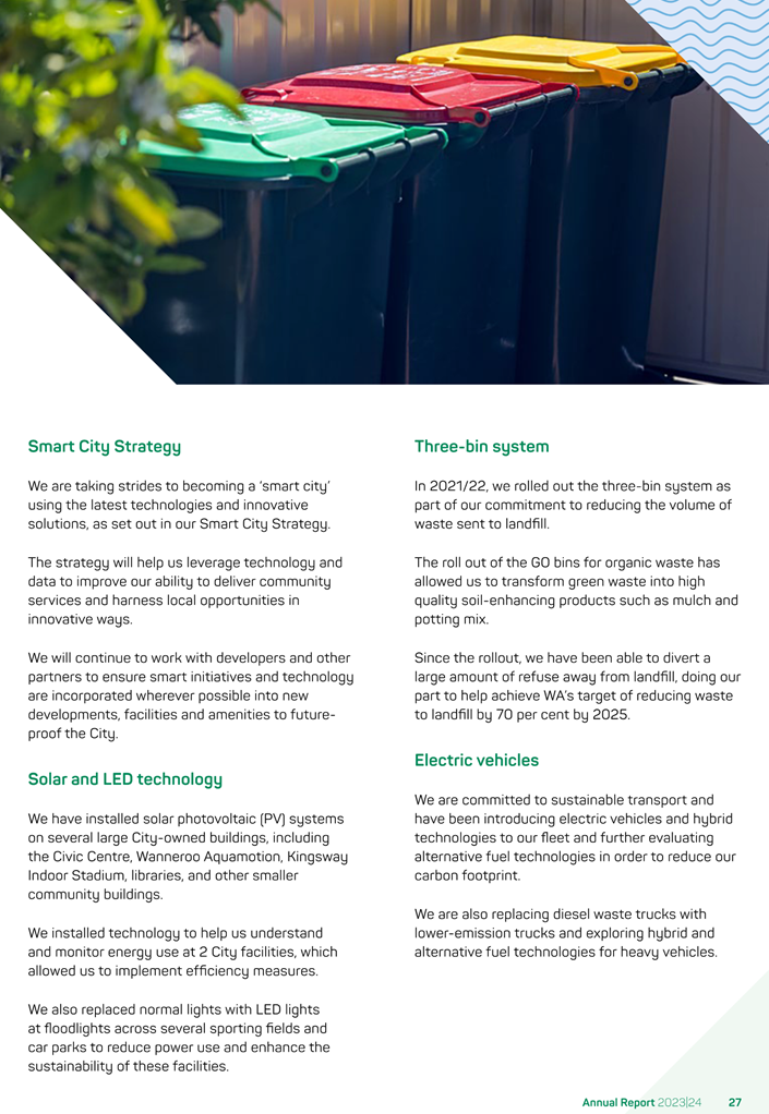 A green bins with a lid

Description automatically generated