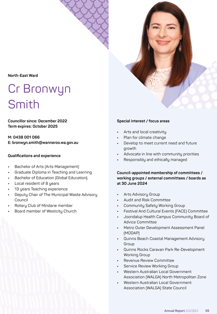 A person in purple suit and white background

Description automatically generated