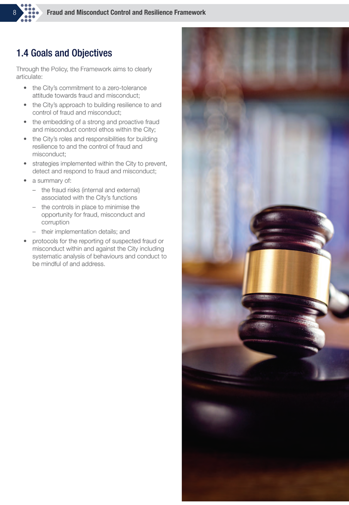 A gavel on a stand

Description automatically generated