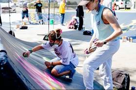 A person painting a wall with spray paint

AI-generated content may be incorrect.