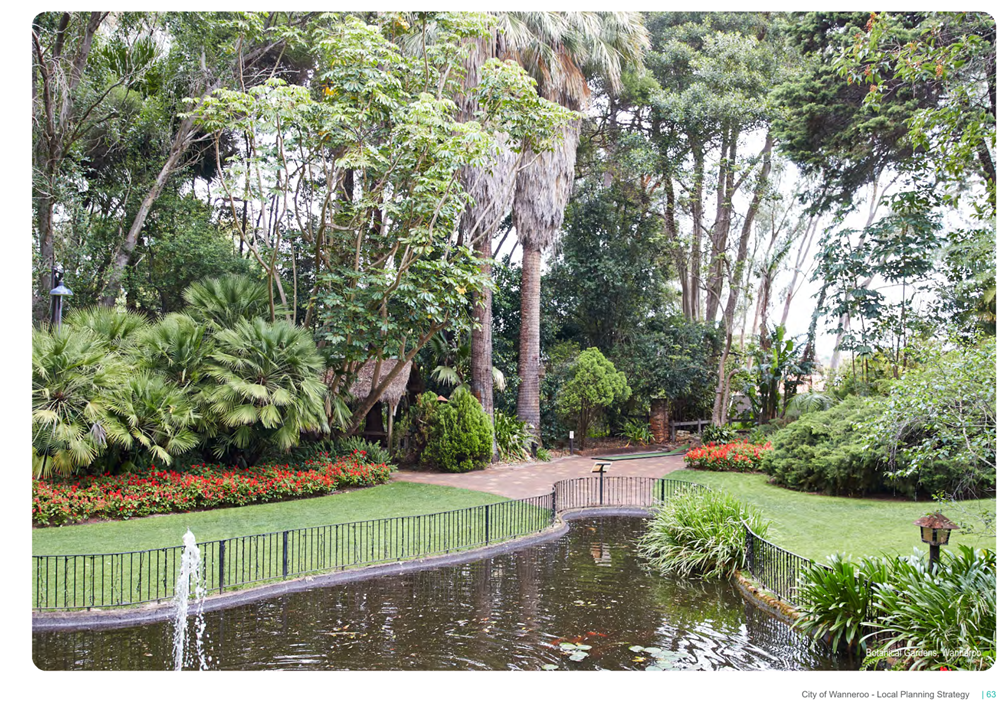 A pond surrounded by trees and bushes

AI-generated content may be incorrect.