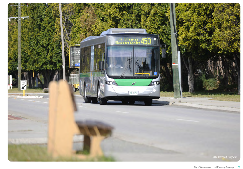 A bus driving down the road

AI-generated content may be incorrect.